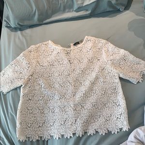 White crochet top with flower detailing